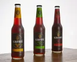 Trzy butelki piwa bezalkoholowego Karmi: Classic, Grejpfrut i Żurawina. Idealne dla tych, którzy szukają smaku bez kalorii i alkoholu 0 kcal.