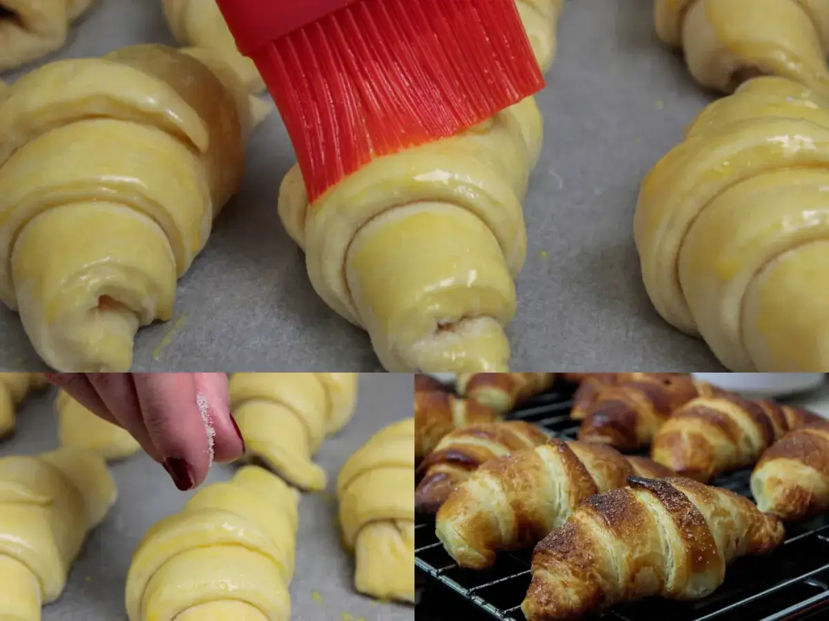 Przygotowanie croissantów: smarowanie surowego ciasta pędzlem i posypywanie cukrem. Gotowe, złociste rogaliki na kratce. Idealny croissant przepis.